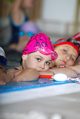 Image showing .childrens in serie at swimming pool 