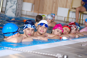 Image showing .childrens in serie at swimming pool 