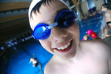 Image showing .children having fun at swimming pool