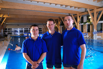 Image showing .swimming school instructors at pool