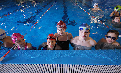 Image showing .childrens in serie at swimming pool 