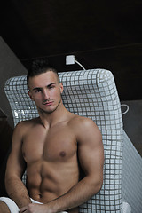 Image showing attractive young man in sauna