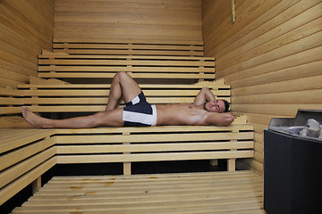 Image showing attractive young man in sauna