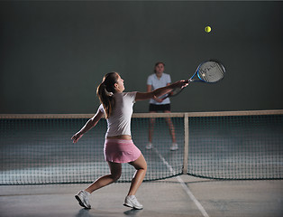 Image showing young girls playing tennis game indoor