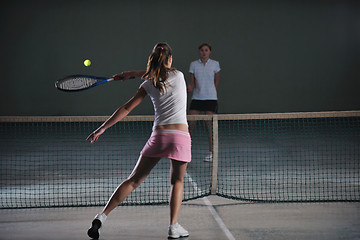 Image showing young girls playing tennis game indoor