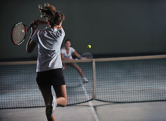 Image showing young girls playing tennis game indoor