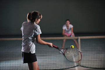 Image showing young girls playing tennis game indoor