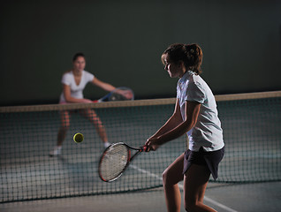 Image showing young girls playing tennis game indoor