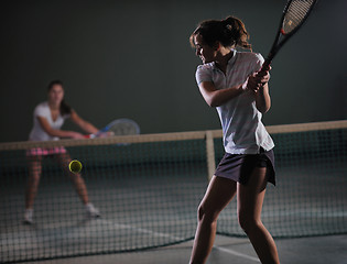 Image showing young girls playing tennis game indoor