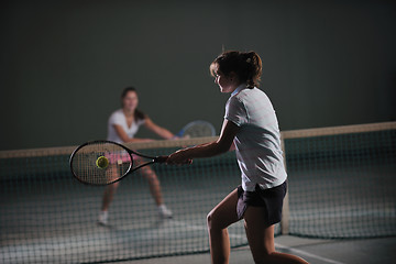 Image showing young girls playing tennis game indoor