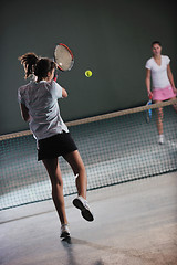 Image showing young girls playing tennis game indoor