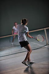 Image showing young girls playing tennis game indoor