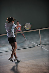 Image showing young girls playing tennis game indoor