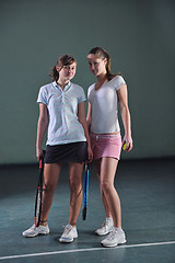 Image showing young girls playing tennis game indoor