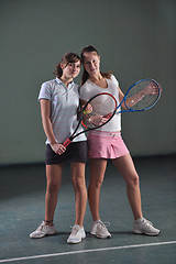 Image showing young girls playing tennis game indoor