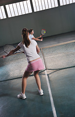 Image showing young girls playing tennis game indoor