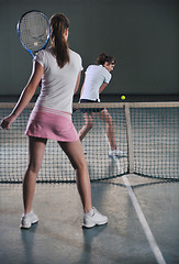 Image showing young girls playing tennis game indoor