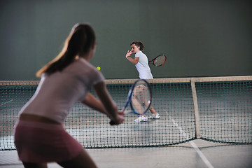 Image showing young girls playing tennis game indoor