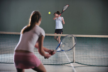 Image showing young girls playing tennis game indoor