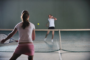 Image showing young girls playing tennis game indoor