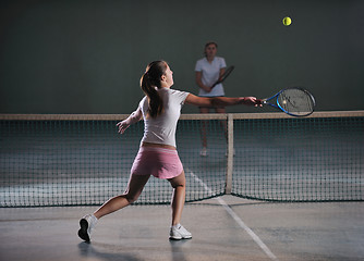 Image showing young girls playing tennis game indoor