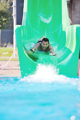 Image showing water slide fun on outdoor pool