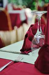 Image showing restaurant table with empty wine glass