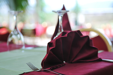 Image showing restaurant table with empty wine glass