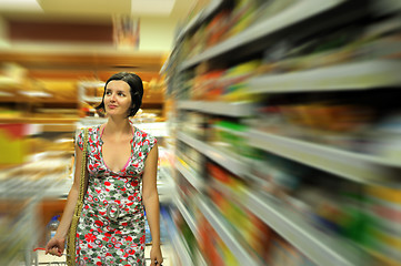 Image showing Young woman shopping in market