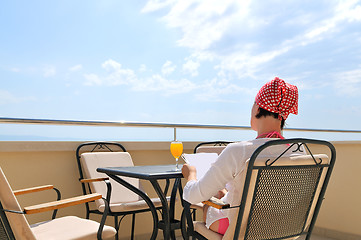 Image showing Young pretty woman enjoying the sun