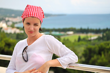 Image showing Young pretty woman enjoying the sun