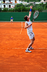 Image showing Man plays tennis outdoors