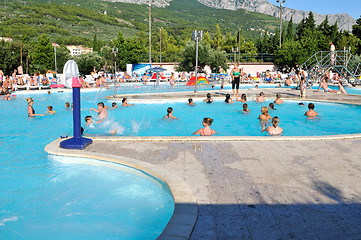 Image showing People having fun in pool