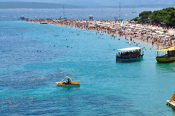 Image showing people relaxing on beach