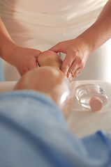 Image showing foot and leg massage at the spa and wellness center