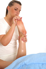 Image showing foot and leg massage at the spa and wellness center