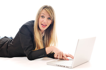 Image showing one young girl work on laptop isolated on white