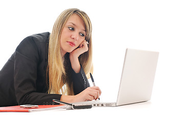 Image showing one young girl work on laptop isolated on white