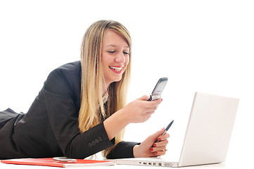 Image showing one young girl work on laptop isolated on white