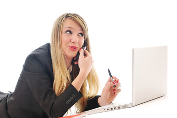 Image showing one young girl work on laptop isolated on white