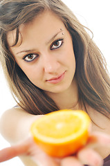 Image showing woman portrait with orange isolated on white 