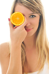 Image showing woman isolated on white hold orange