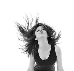 Image showing party woman isolated with wind in hair