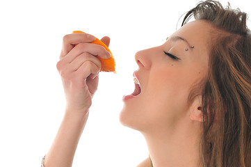 Image showing woman isolated on white hold orange