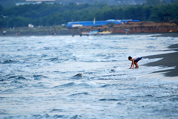 Image showing childs having fun on beach at early morning