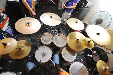 Image showing music band have training in garage