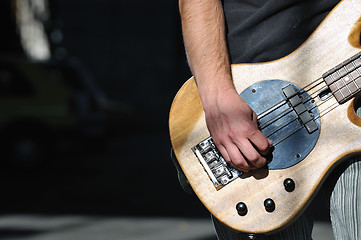 Image showing music guitar player outdoor 