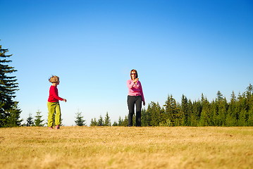 Image showing mother and kids having fun outside