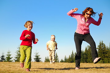 Image showing mother and kids having fun outside