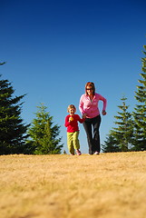 Image showing mother and daughter jogging